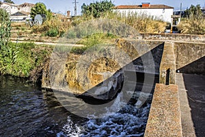 Waterfall in the canal photo