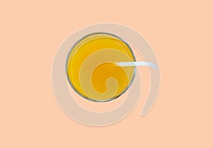 Summer drink - freshly squeezed orange juice in a glass with a straw tube, top view, isolated on a pink background with clipping,