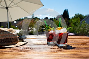 Summer drink on sunny terrace