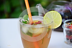 summer drink, tea with wild berries, lime, raspberries and blueberries, summer vacation, vacations. Raspberry mojito