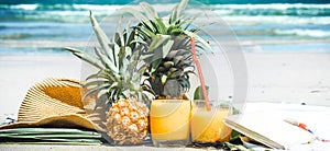 Summer drinks with fruit on the beach, exotic still life