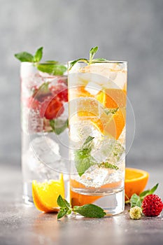 Summer drinks with strawberry and orange