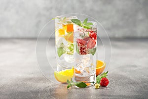 Summer drinks with strawberry and orange