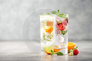 Summer drinks with strawberry and orange