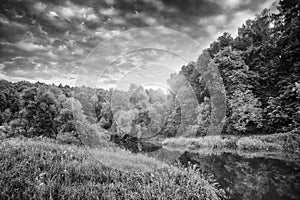 Summer evening on the mountain river black and white landscape