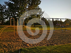 Monkey bars and swingset photo