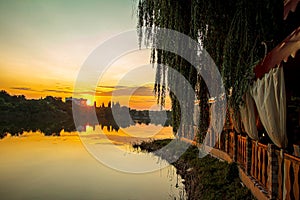Summer evening sunset over the pond.