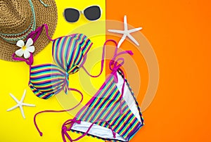 Summer Fashion woman swimsuit Bikini. Tropical sea.Unusual top view, colorful background.