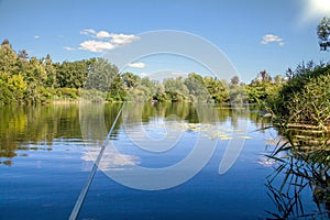 Summer fishing angling at lake sunlight relax hobby