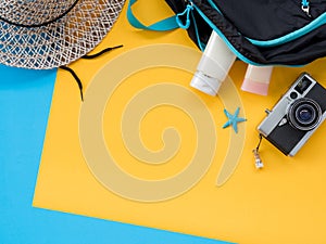 Summer Flat Lay Photo with blue and yellow background.