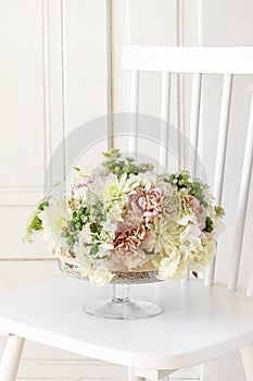 Summer floral arrangement with roses, dahlias and hortensias