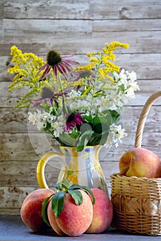 Summer flowers and peaches