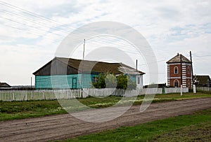 Summer foggy morning in a village in Siberia in summer