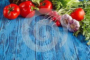 Summer frame with fresh organic vegetables and fruits on wooden