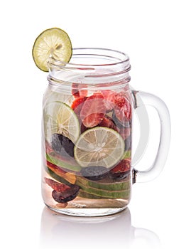 Summer fresh fruit drink. fruit Flavored water mix with strawberries, lime, grape, cucumber and mint leaves