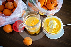 Summer fresh orange fruit getting squeezed
