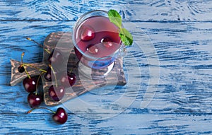 Summer fruit cocktail with fresh sweet cherries