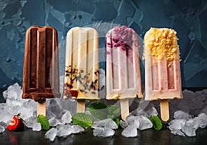 Summer fruit ice lolly popcicle on a dark background, AI Generated