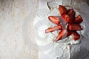 Summer fruit Pavlova with strawberries. Top view and copy space