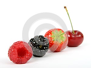 Summer fruit salad ingredients, strawberry, blackberry, cherry