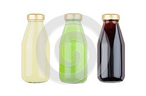 Summer fruits juices - cane, kiwi, pomegranade in glass bottles isolated, mock up for design, advertising, branding product.