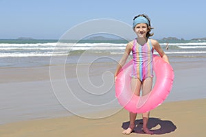 Summer fun portrait: child at the beach