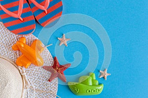 Summer fun time and accessories on blue background. Mock up, with empty space for text