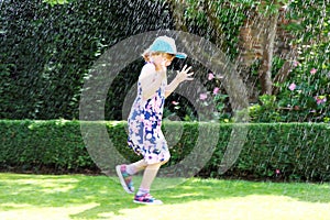 Summer fun with water sprinkler