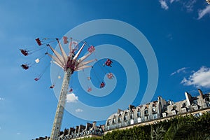 A summer funfair in the Tuileries Gardens, in the center of Par