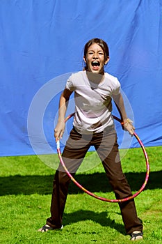 Summer girl and hula hoop