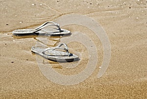 Summer girl shoes on the beach