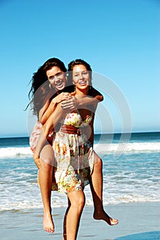 Summer girls playing in the sea