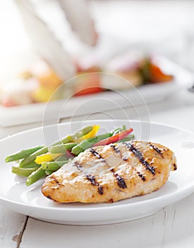 Summer grilling time - grilled chicken with vegetables.