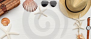 Summer hat and sunglasses with wrist watches and shells