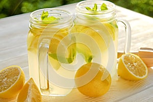 Summer healthy non alcoholic cocktails, citrus infused water drinks, lemonades with lime lemon or orange, diet detox beverages.