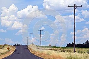 Summer heat haze on a country road through farmland