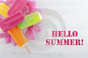Summer is Here concept with bright color ice creams photo