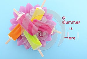 Summer is Here concept with bright color ice creams