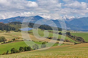 Summer hills landscape with solar panels in Slovakia.