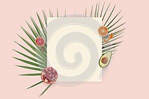 Summer holiday card copyspace. Fruit flatlay top view with paper on the pink background