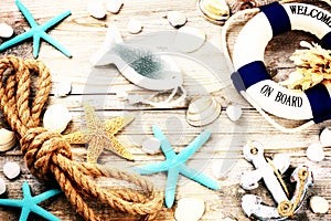 Summer holiday frame with seashells and beach accessories