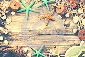 Summer holiday frame with seashells and fishing net. Vacation ba