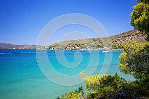 Summer holiday in Greece. Spectacular view on one of the most beautiful beaches in Poros Island. Summer holiday