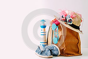 Summer holiday travel concept.Hipster Beach bag with items for a