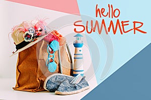 Summer holiday travel concept.Hipster Beach bag with items for a