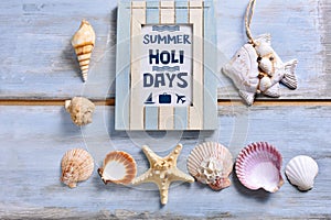 Summer holidays background with a frame with inscription and shells