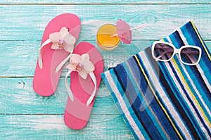 Summer Holidays. Beachwear on wooden background