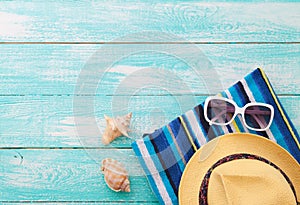 Summer Holidays. Beachwear on wooden background