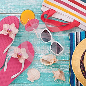 Summer Holidays. Beachwear on wooden background