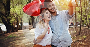 Summer holidays, celebration and dating concept - happy couple